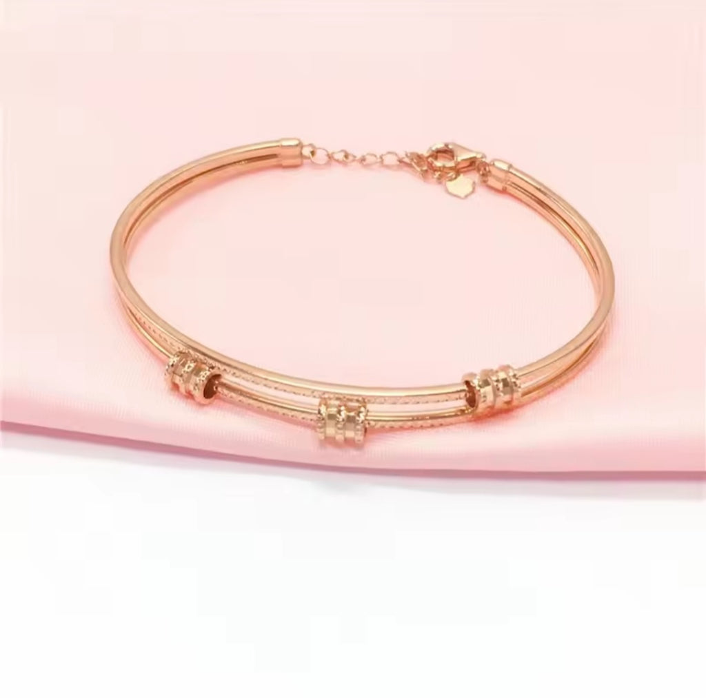 Rose Gold Geometric Bracelet with Purple Details – Elegant Women’s Jewelry