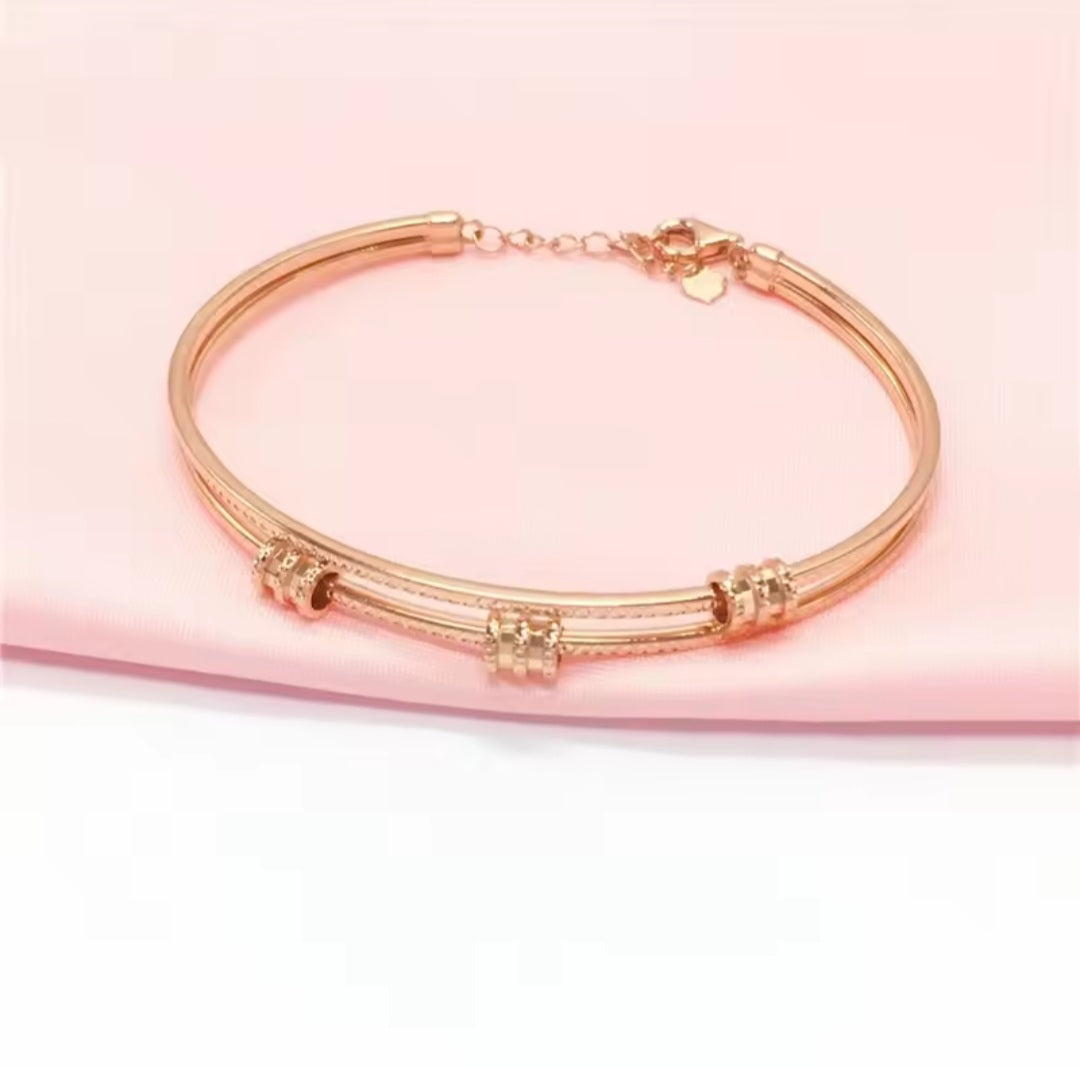 Rose Gold Geometric Bracelet with Purple Details – Elegant Women’s Jewelry