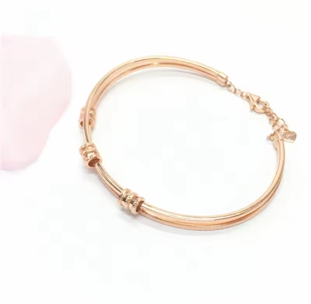 Rose Gold Geometric Bracelet with Purple Details – Elegant Women’s Jewelry