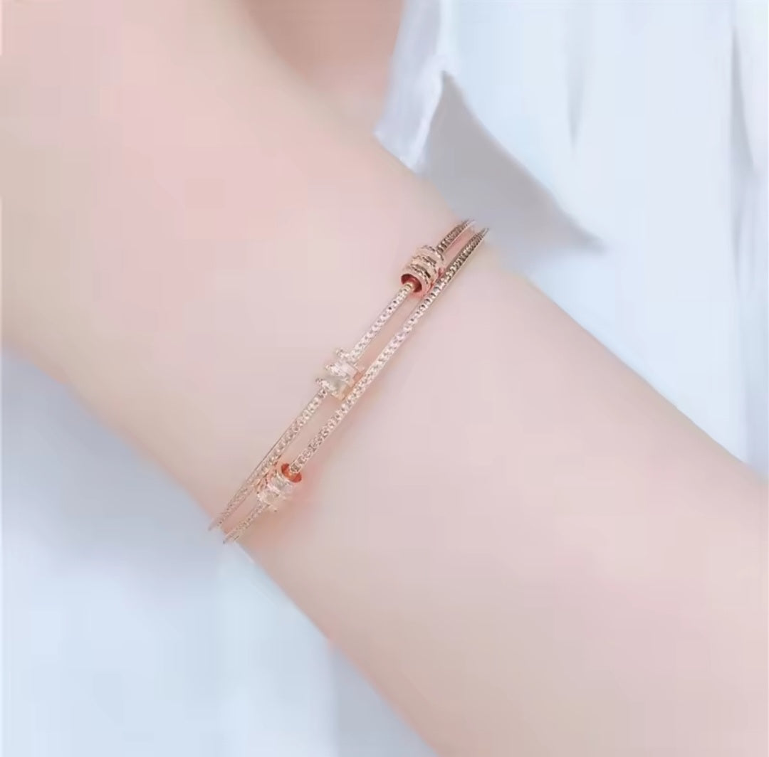 Rose Gold Geometric Bracelet with Purple Details – Elegant Women’s Jewelry
