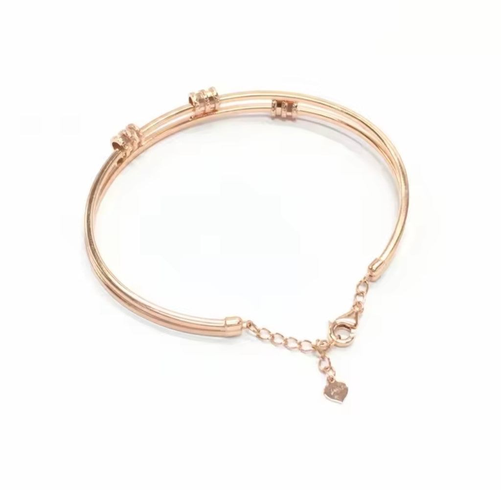 Rose Gold Geometric Bracelet with Purple Details – Elegant Women’s Jewelry
